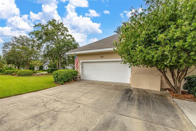 garage with a lawn