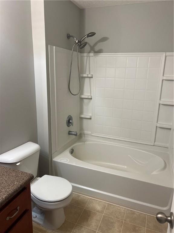 full bathroom with vanity, tile patterned floors, bathtub / shower combination, and toilet