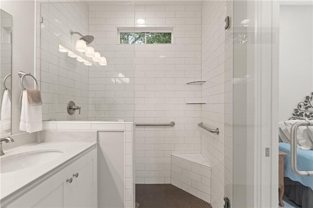 bathroom with vanity and walk in shower