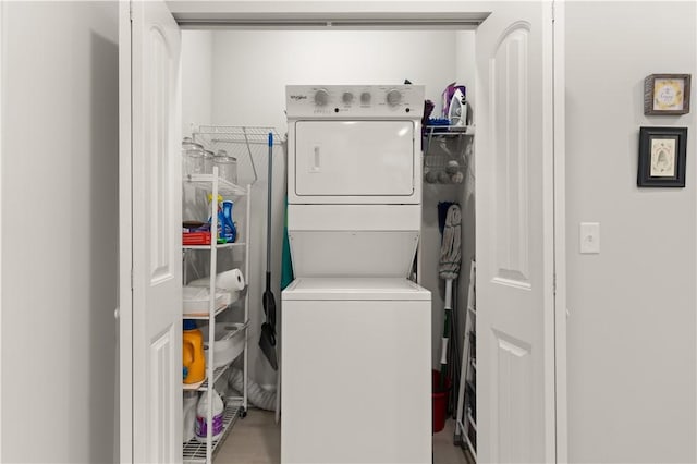 laundry room featuring stacked washer and dryer