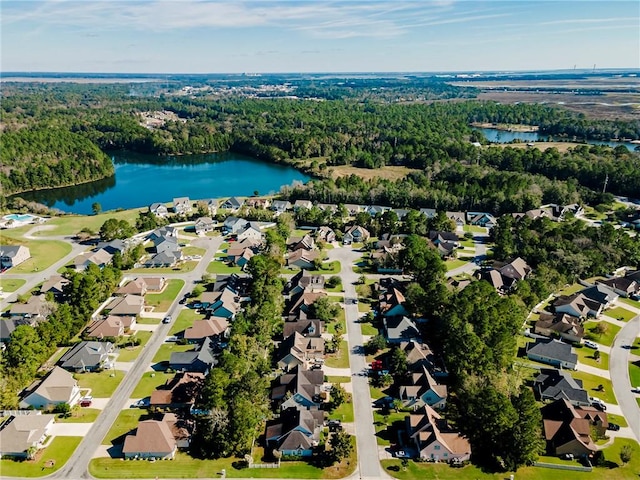 drone / aerial view with a water view