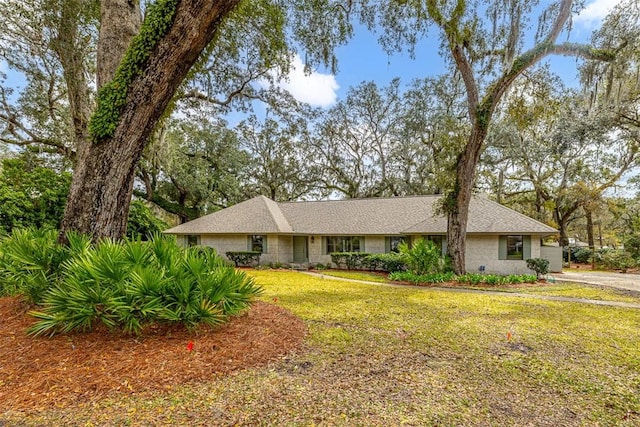 217 Five Pounds Rd, Saint Simons Island, GA 31522 - ranch-style home featuring a front yard