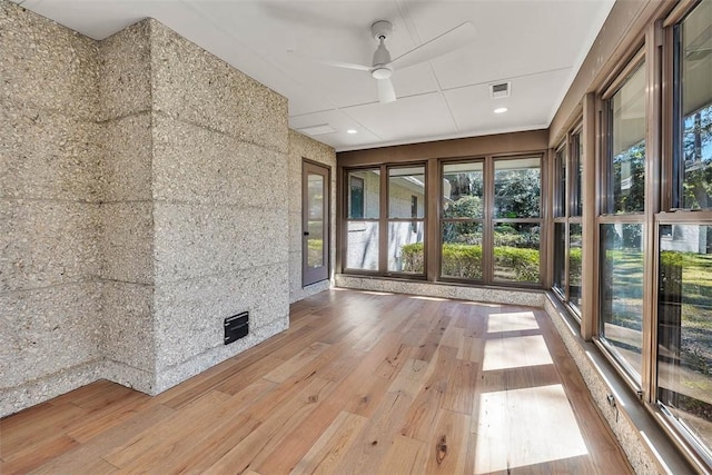 217 Five Pounds Rd, Saint Simons Island, GA 31522 - unfurnished sunroom featuring hardwood / wood-style flooring, healthy amount of natural light, and recessed lighting