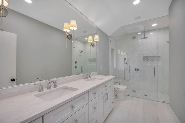 217 Five Pounds Rd, Saint Simons Island, GA 31522 - full bathroom with a stall shower, double vanity, recessed lighting, and toilet