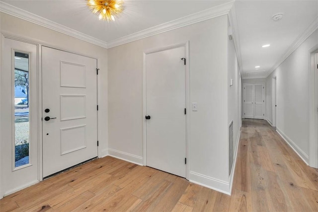 217 Five Pounds Rd, Saint Simons Island, GA 31522 - entrance foyer with crown molding, light wood-style floors, baseboards, and recessed lighting