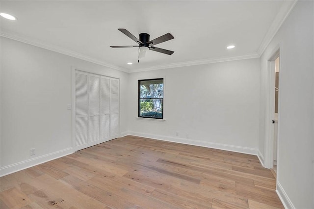 217 Five Pounds Rd, Saint Simons Island, GA 31522 - unfurnished bedroom featuring recessed lighting, light wood finished floors, a closet, baseboards, and crown molding