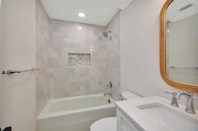 217 Five Pounds Rd, Saint Simons Island, GA 31522 - full bath featuring toilet, vanity, tub / shower combination, and recessed lighting