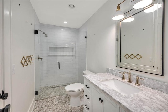 111 Youngwood Dr, Saint Simons Island, GA 31522 - bathroom with a shower stall, vanity, and recessed lighting
