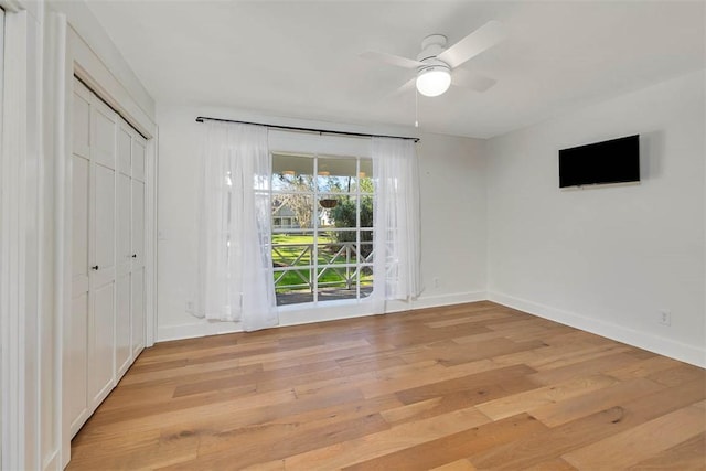 111 Youngwood Dr, Saint Simons Island, GA 31522 - unfurnished bedroom with light wood-type flooring, a closet, and ceiling fan