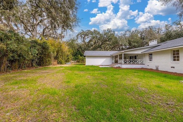 111 Youngwood Dr, Saint Simons Island, GA 31522 - view of green lawn featuring view of scattered trees