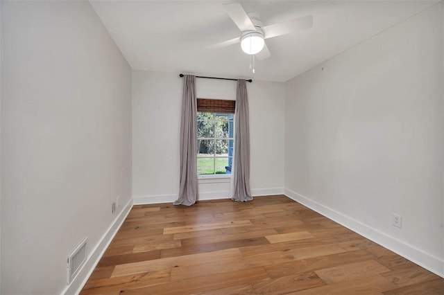 111 Youngwood Dr, Saint Simons Island, GA 31522 - spare room with light wood-style flooring and a ceiling fan