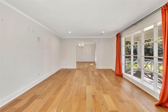 111 Youngwood Dr, Saint Simons Island, GA 31522 - unfurnished room featuring light wood-style floors, ornamental molding, a chandelier, and recessed lighting