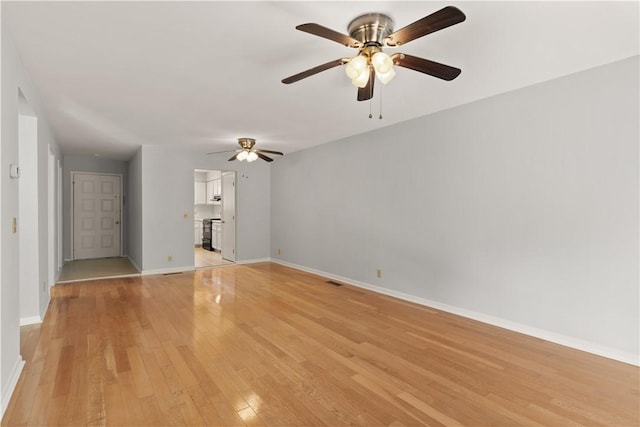 unfurnished living room featuring light hardwood / wood-style floors