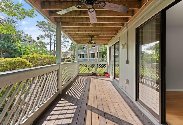 wooden deck with ceiling fan