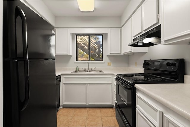 kitchen featuring sink, white cabinets, and black appliances