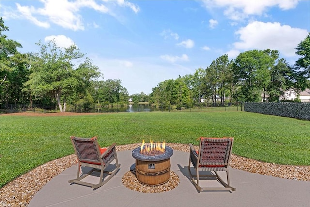 98 Bartram Trl, Brunswick, GA 31523 - view of patio / terrace with a fire pit and a water view