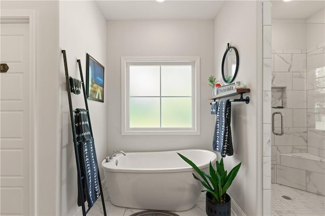98 Bartram Trl, Brunswick, GA 31523 - bathroom featuring a shower stall and a freestanding bath