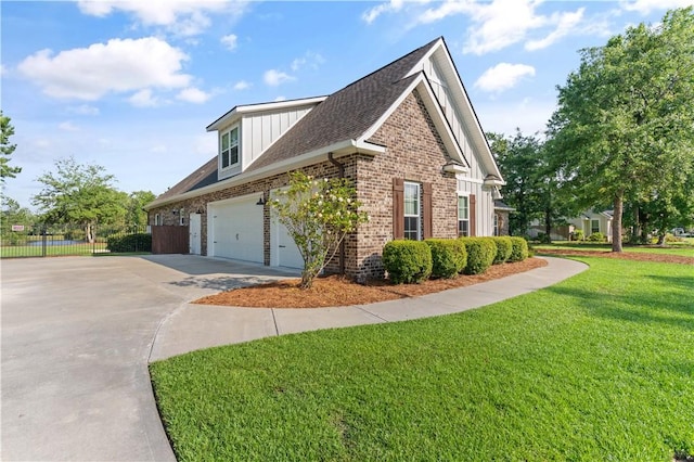 98 Bartram Trl, Brunswick, GA 31523 - view of property exterior with concrete driveway, brick siding, a garage, and roof with shingles