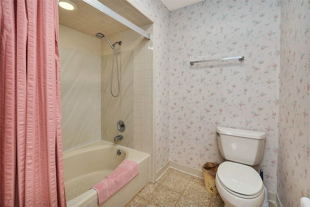 full bathroom with toilet, bathing tub / shower combination, baseboards, and wallpapered walls