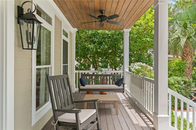553 Park Ave, Saint Simons Island, GA 31522 - porch featuring ceiling fan