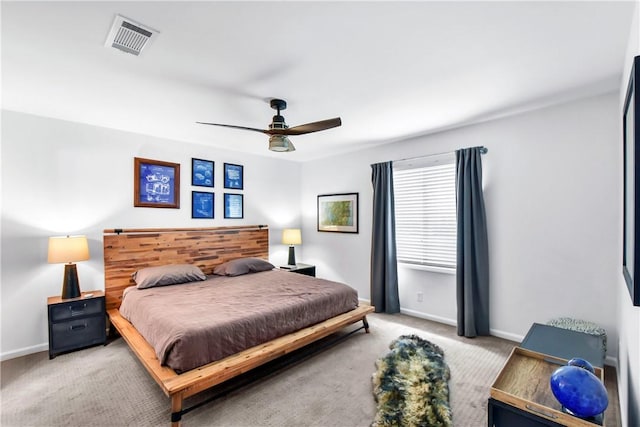 bedroom with ceiling fan and carpet