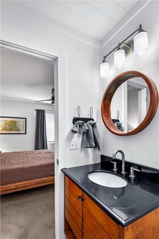 bathroom featuring ceiling fan and vanity