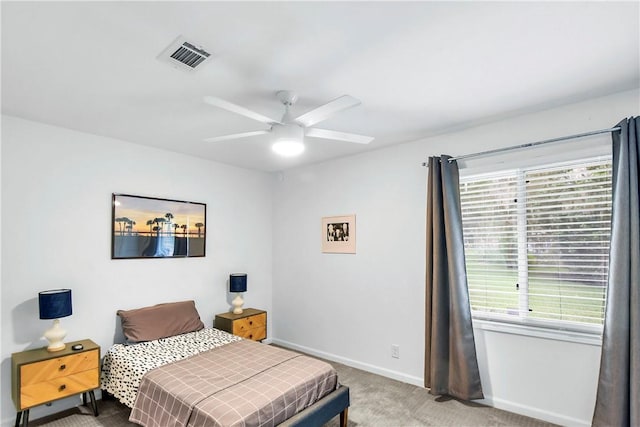 bedroom with ceiling fan and carpet floors