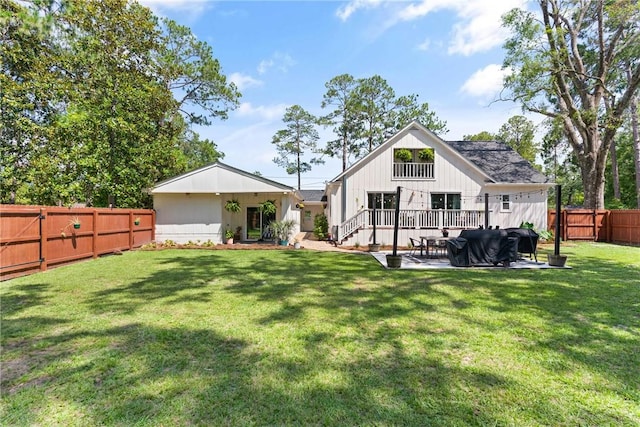 686 S Fourth St, Jesup, GA 31545 - back of house featuring a fenced backyard and a patio area