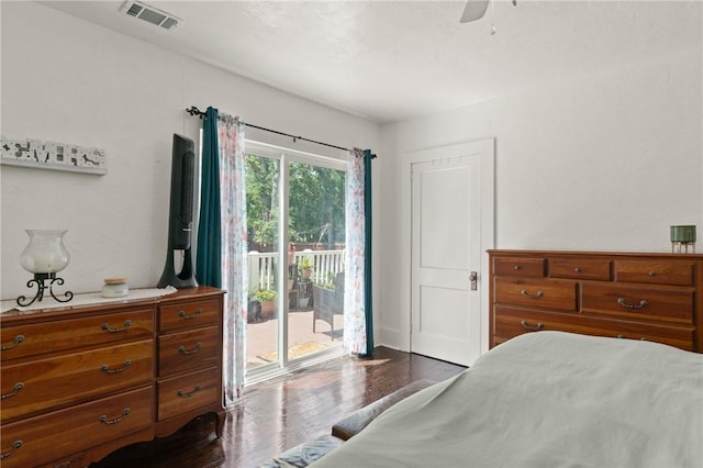 686 S Fourth St, Jesup, GA 31545 - bedroom with access to outside, dark wood-type flooring, and a ceiling fan
