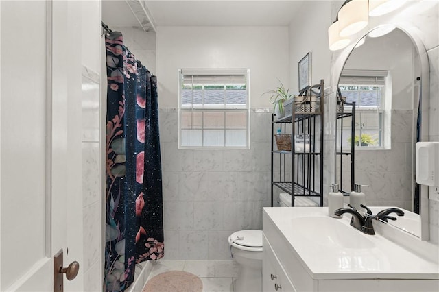686 S Fourth St, Jesup, GA 31545 - bathroom with tile walls, vanity, healthy amount of natural light, curtained shower, and marble finish floors