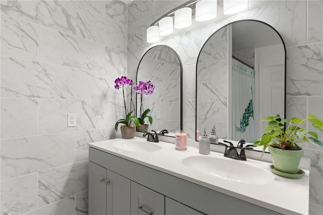 686 S Fourth St, Jesup, GA 31545 - bathroom featuring tile walls and double vanity