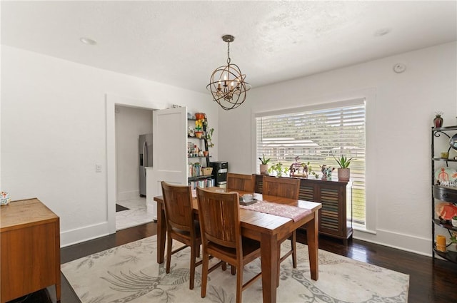 686 S Fourth St, Jesup, GA 31545 - dining room featuring a chandelier and dark wood finished floors