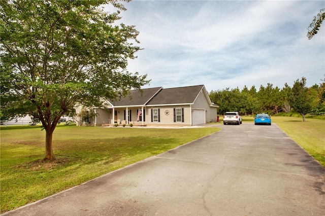 4901 Stanfield Rd, Patterson, GA 31557 - view of front of home featuring a front lawn and a garage