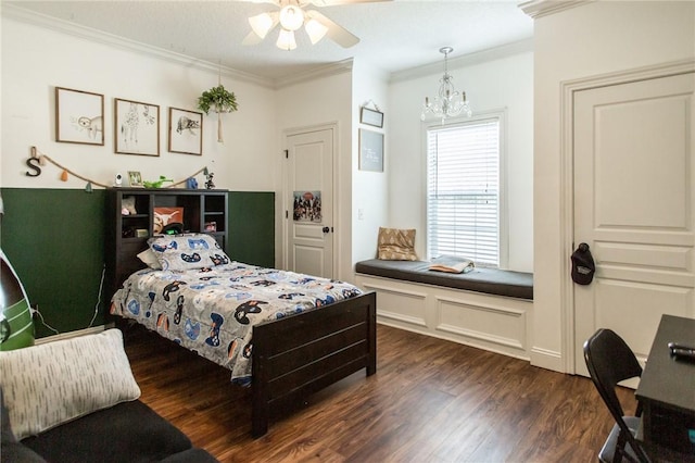4901 Stanfield Rd, Patterson, GA 31557 - bedroom featuring crown molding, dark wood-style floors, a chandelier, and a ceiling fan