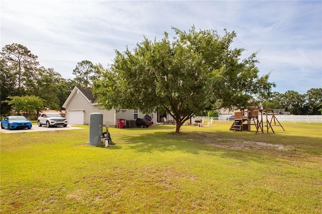 4901 Stanfield Rd, Patterson, GA 31557 - view of yard featuring a playground and a garage