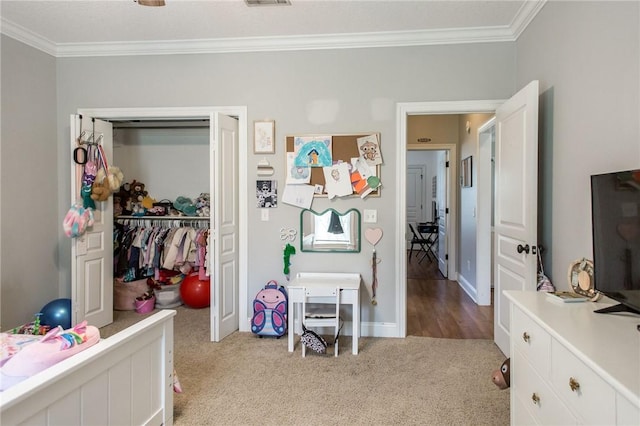 4901 Stanfield Rd, Patterson, GA 31557 - bedroom with crown molding, light colored carpet, and a closet