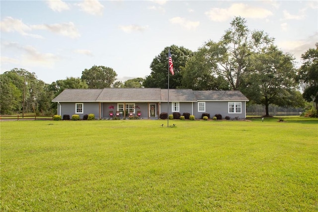 313 White Pine Highway, Nicholls, GA 31554 - ranch-style house featuring a front lawn