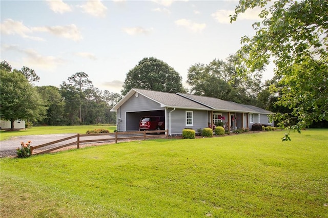 313 White Pine Highway, Nicholls, GA 31554 - view of front of property with driveway, a garage, and a front yard