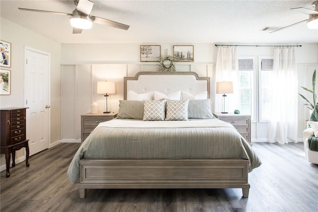 313 White Pine Highway, Nicholls, GA 31554 - bedroom with wood finished floors, ceiling fan, and baseboards