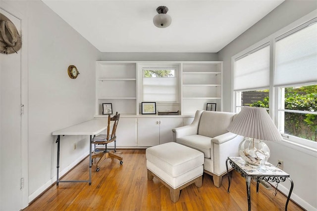 sitting room with light wood-type flooring