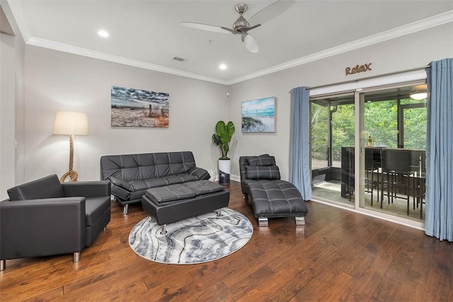 living room with ceiling fan, crown molding, and dark hardwood / wood-style floors