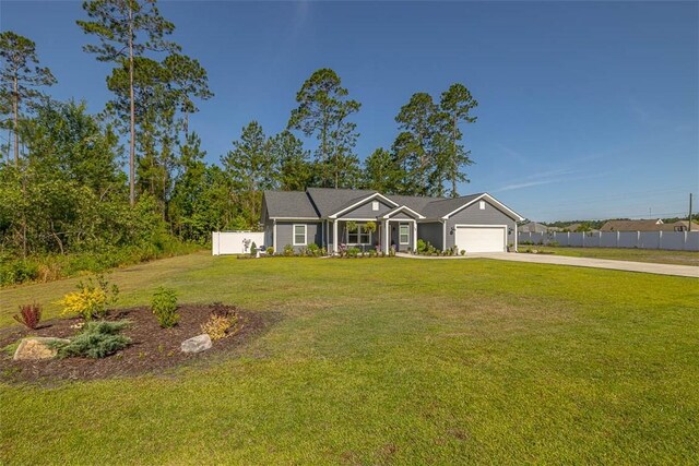 12 Hunters Dr, Brunswick, GA 31523 - view of front facade featuring driveway and an attached garage