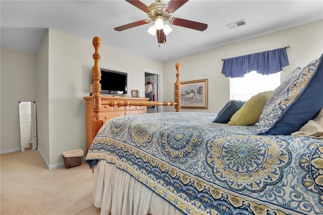 carpeted bedroom featuring ceiling fan