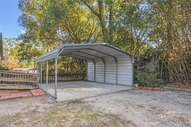 view of parking / parking lot featuring a carport