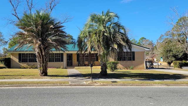 view of front of home with a front yard