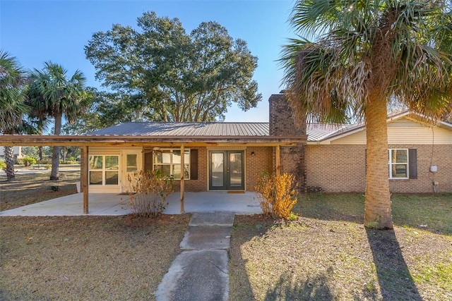 single story home with a patio area