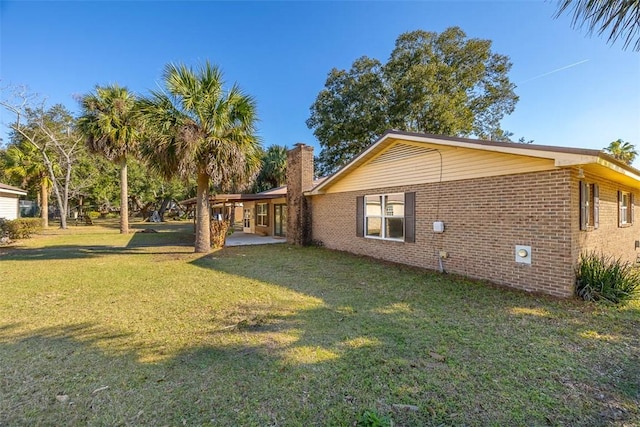 exterior space featuring a lawn