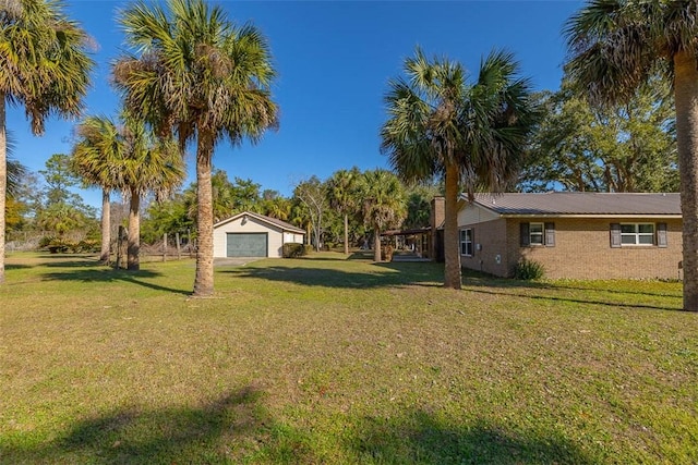 view of yard featuring a garage