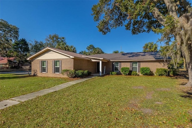 single story home featuring a front yard