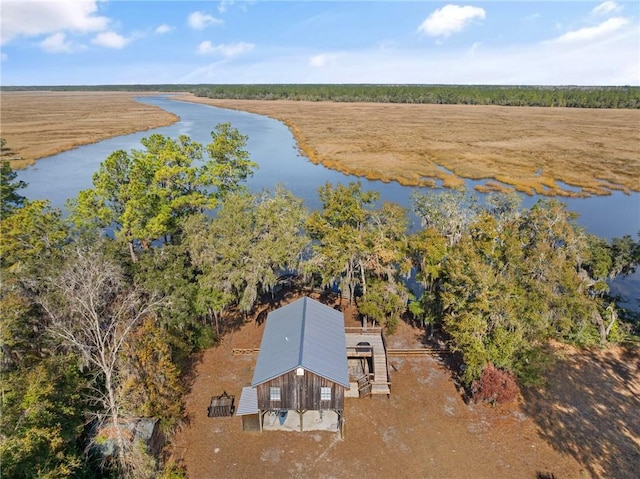 aerial view with a water view and a rural view